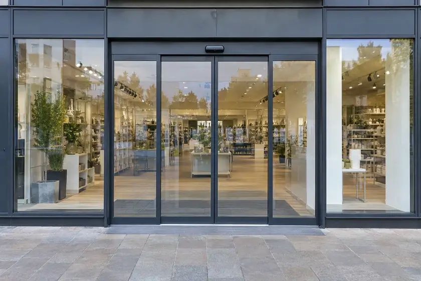 Illustrative Safety Film Surveys scene: Automatic sliding glass shopfront doors.
